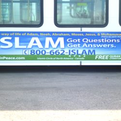 A bus advertisement for Islam is displayed.